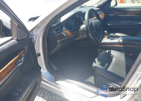 2015 BMW 750Li из США, поврежденный, VIN WBAYE8C5XFD781635